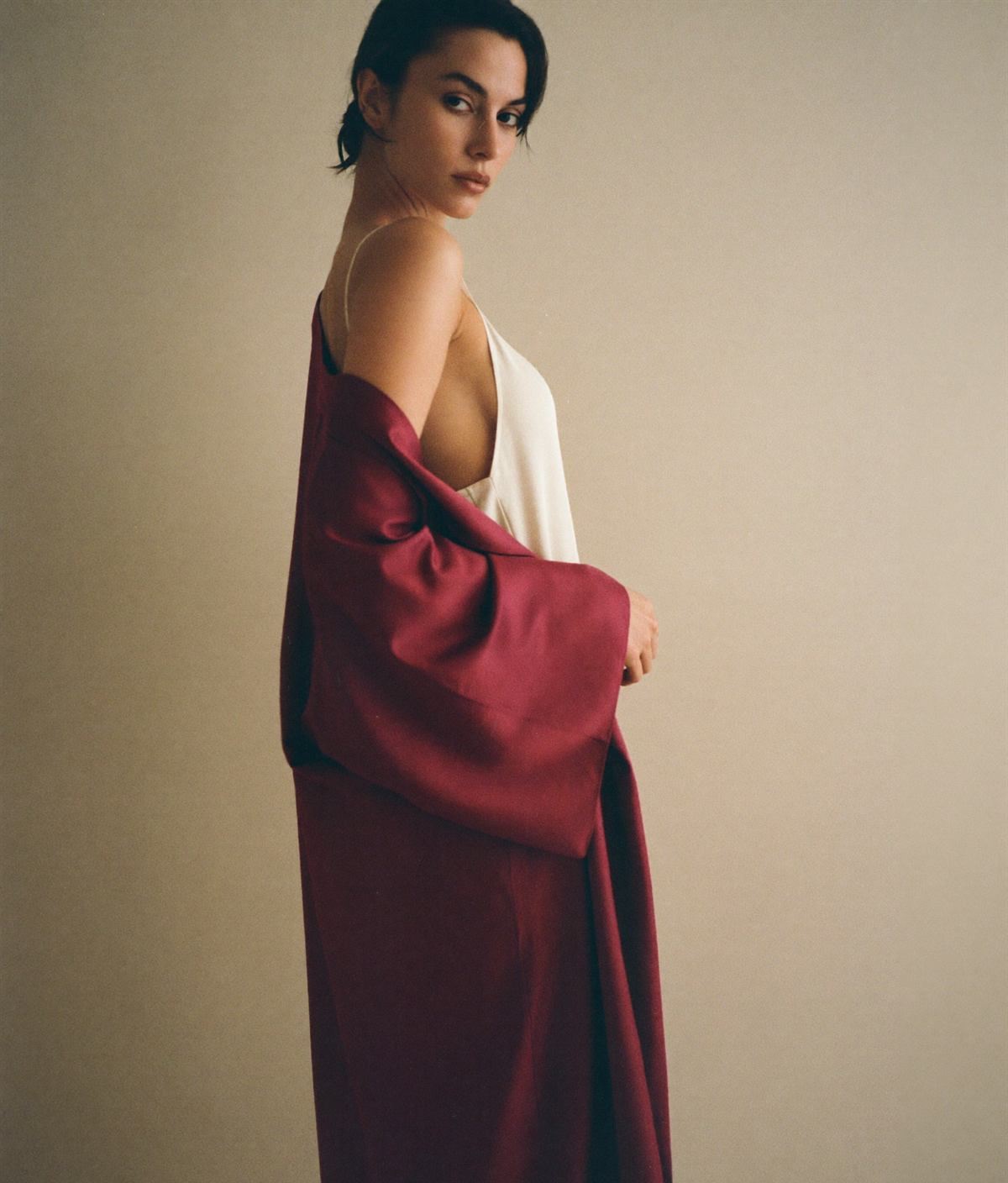 Model in a deep burgundy silk robe from the Milana Premium FW ’26 collection